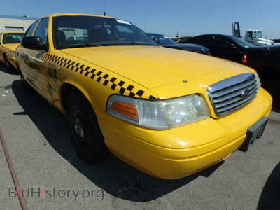 2003 Ford CROWN VIC Crown Vict, yellow — VIN 2FDFP72943X185534, Copart