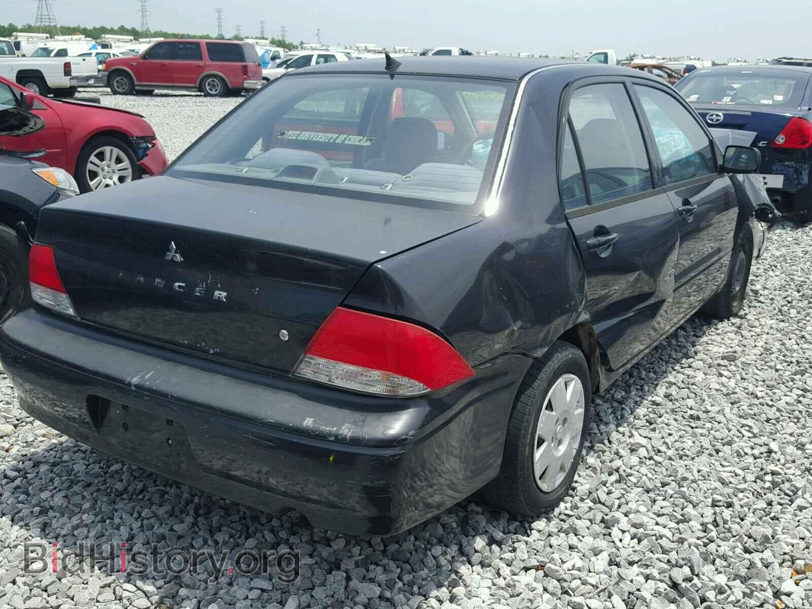 2002 MITSUBISHI LANCER - VIN: JA3AJ26EX2U062029 - Photo 4