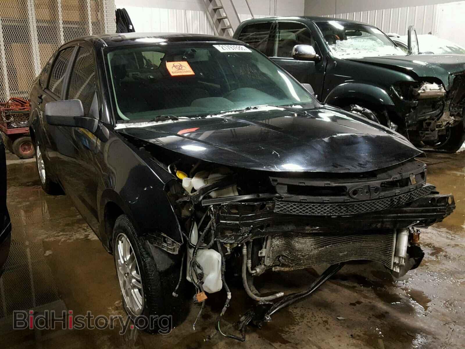 Photo 1FAHP35N49W118945 - FORD FOCUS 2009
