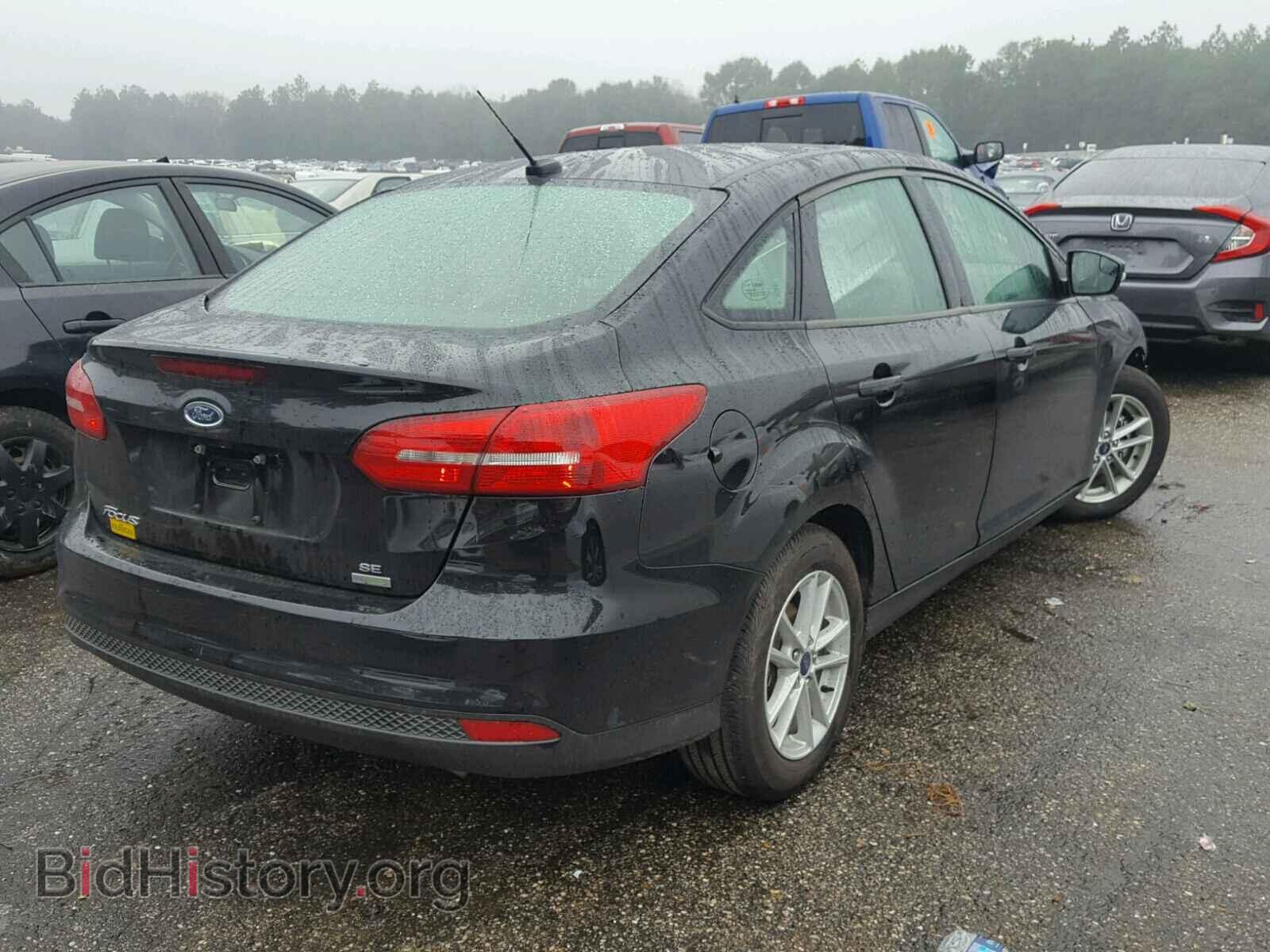 2017 FORD FOCUS - VIN: 1FADP3FE4HL317393 - Photo 4
