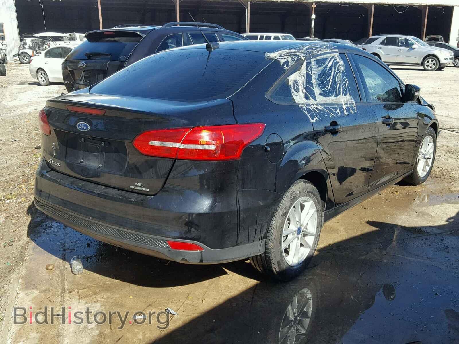 2016 FORD FOCUS - VIN: 1FADP3F27GL350974 - Photo 4