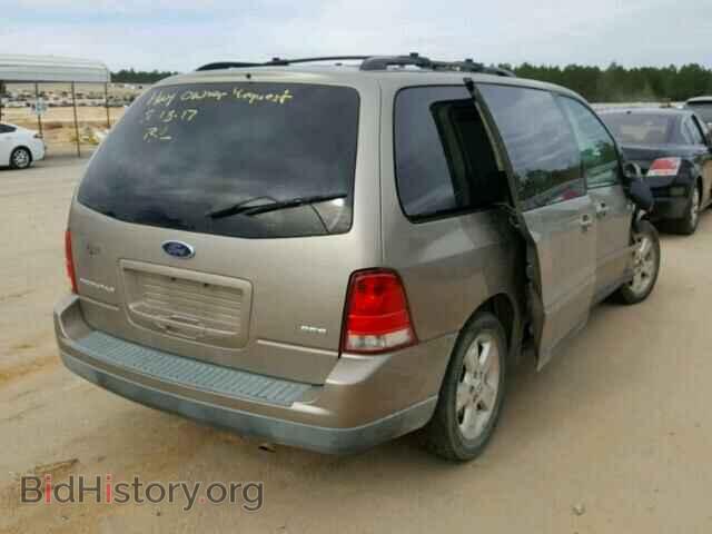 2004 FORD FREESTAR - VIN: 2FMDA57674BB29410 - Фото 4