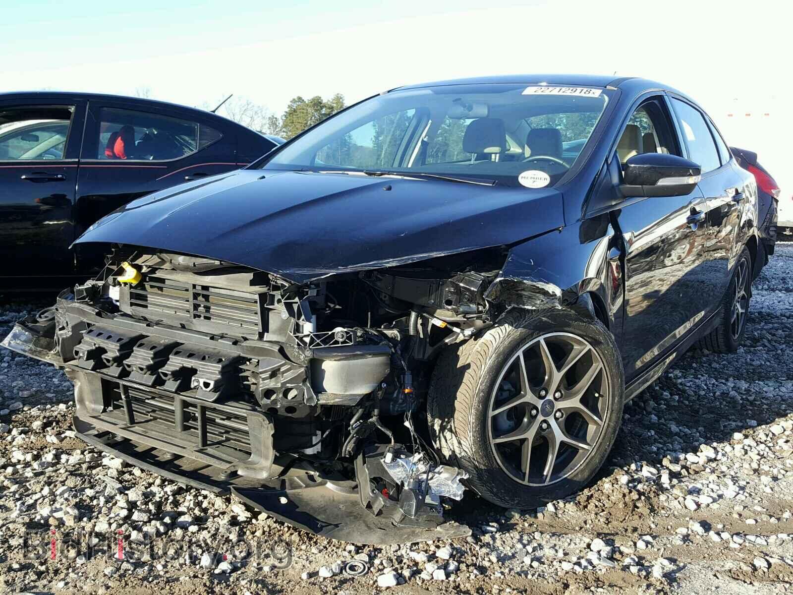 2016 FORD FOCUS - VIN: 1FADP3F20GL327861 - Photo 2