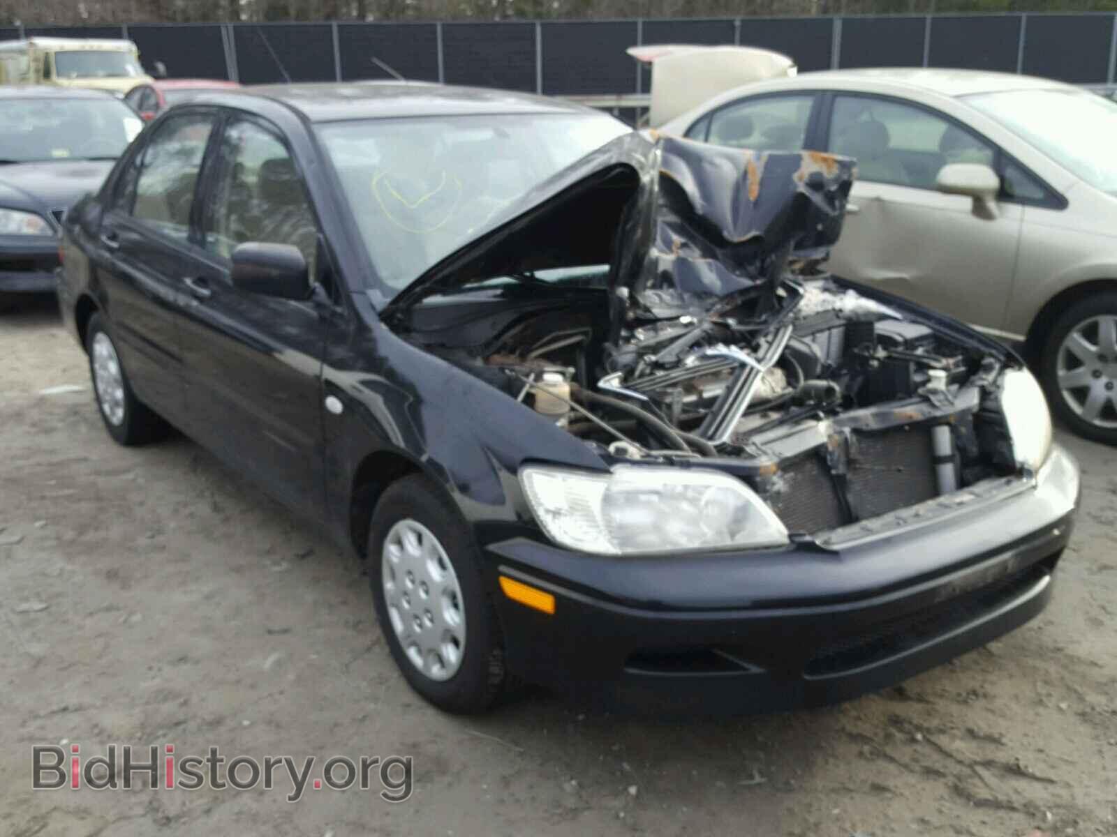 Photo JA3AJ26E32U068321 - MITSUBISHI LANCER 2002