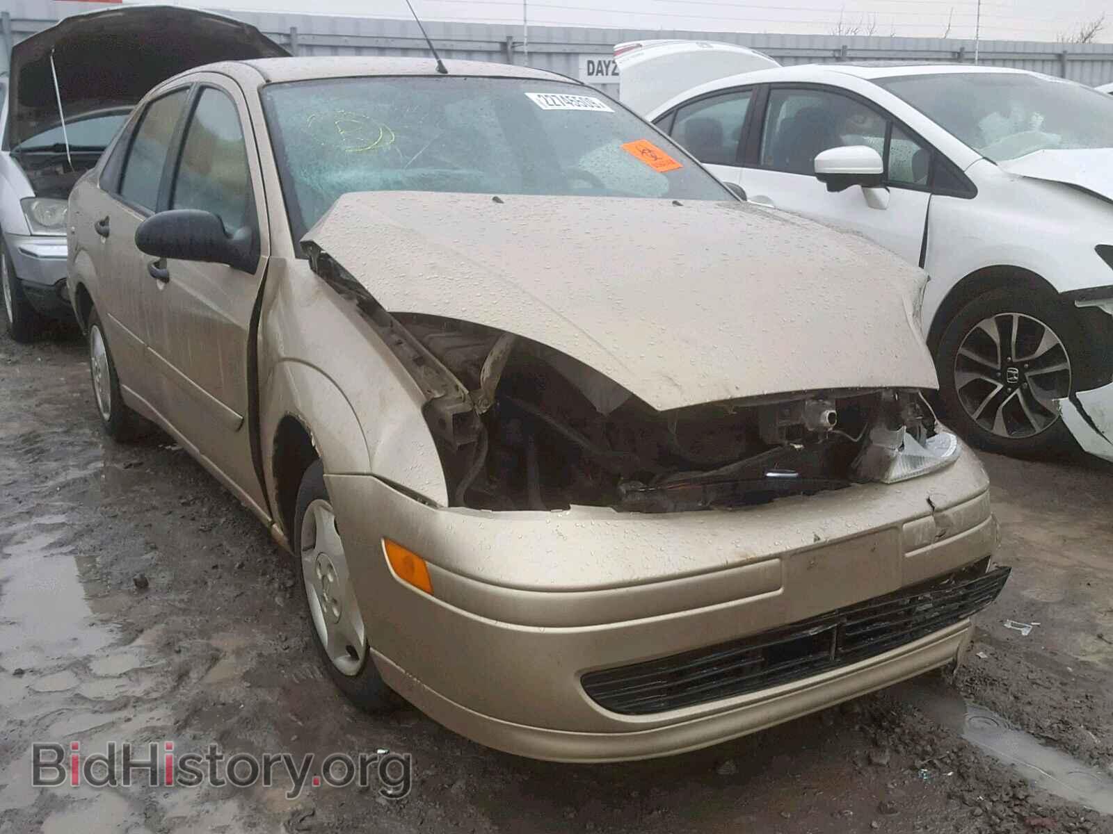 Фотография 1FAFP34P21W338423 - FORD FOCUS SE 2001