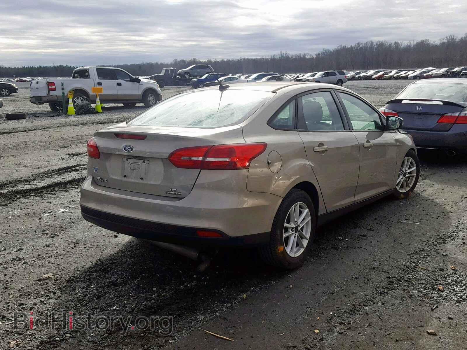 2015 FORD FOCUS - VIN: 1FADP3F20FL338809 - Photo 4