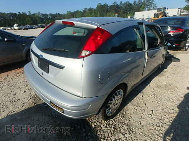 2007 FORD FOCUS - VIN: 1FAFP31N17W303321 - Photo 4