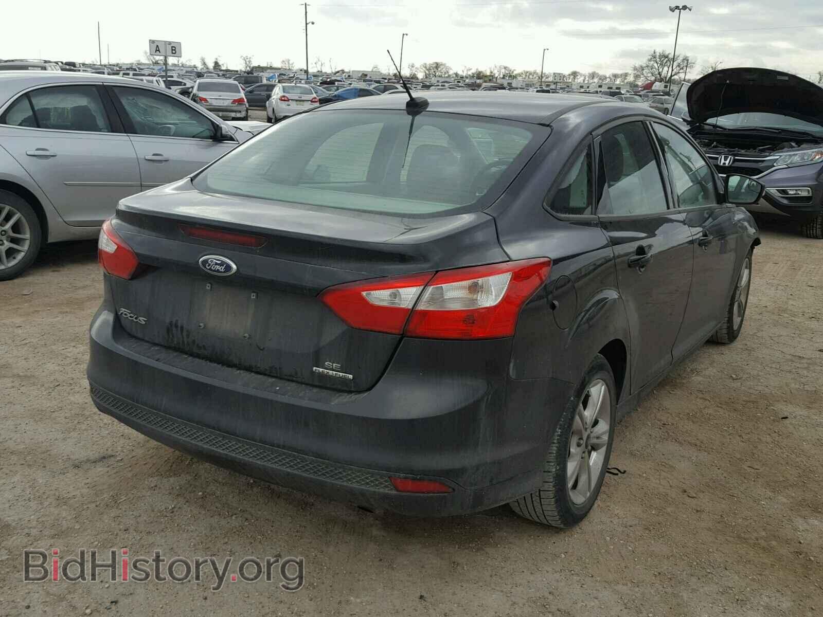 2014 FORD FOCUS - VIN: 1FADP3F20EL218507 - Photo 4