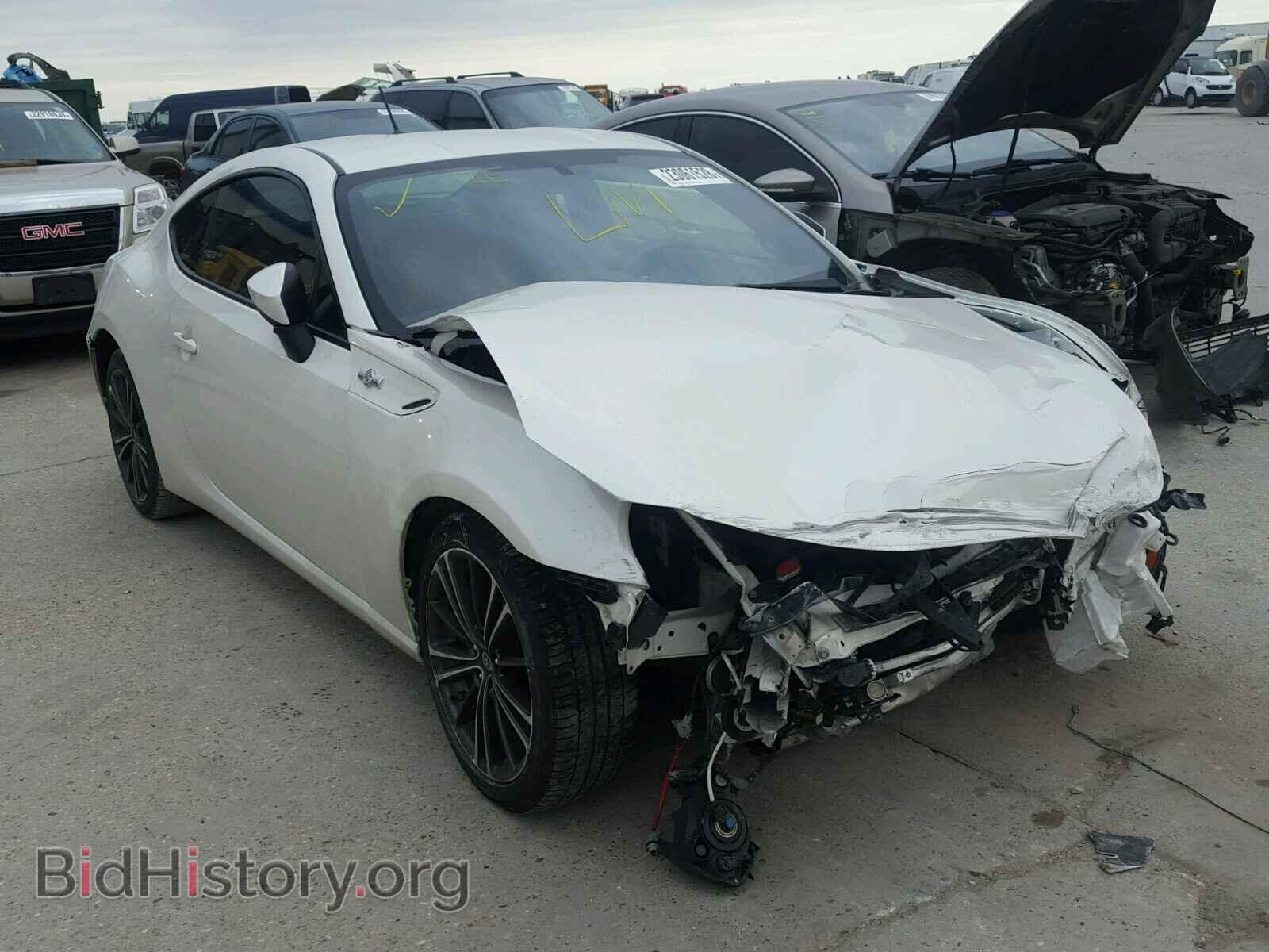 Фотография JF1ZNAA13E9709620 - TOYOTA SCION 2014