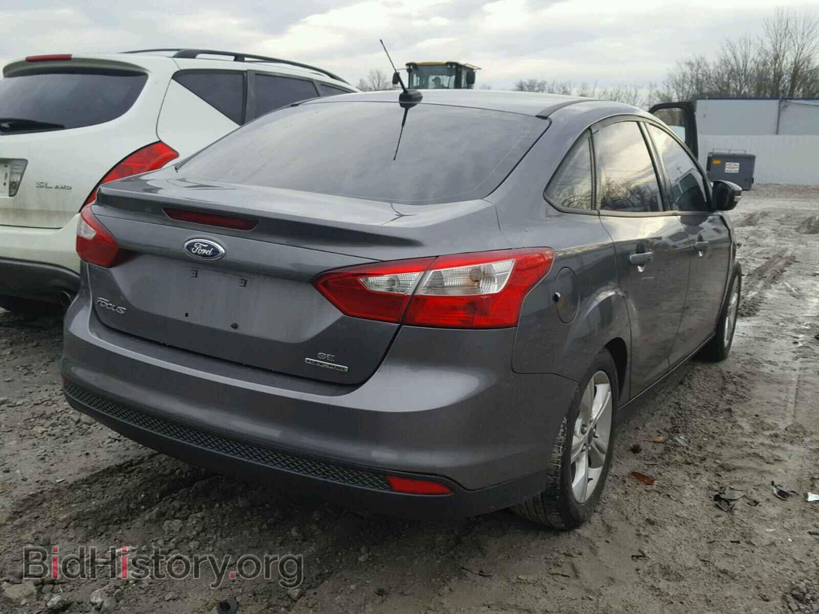 2014 FORD FOCUS - VIN: 1FADP3F22EL106601 - Photo 4