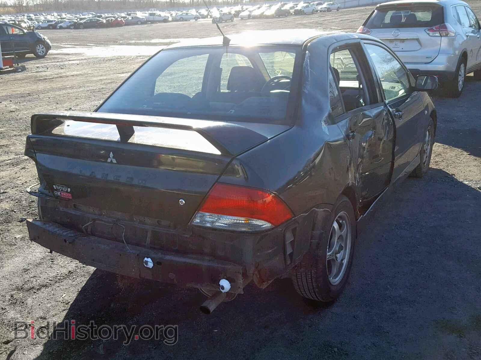 2002 MITSUBISHI LANCER - VIN: JA3AJ86E32U060691 - Photo 4