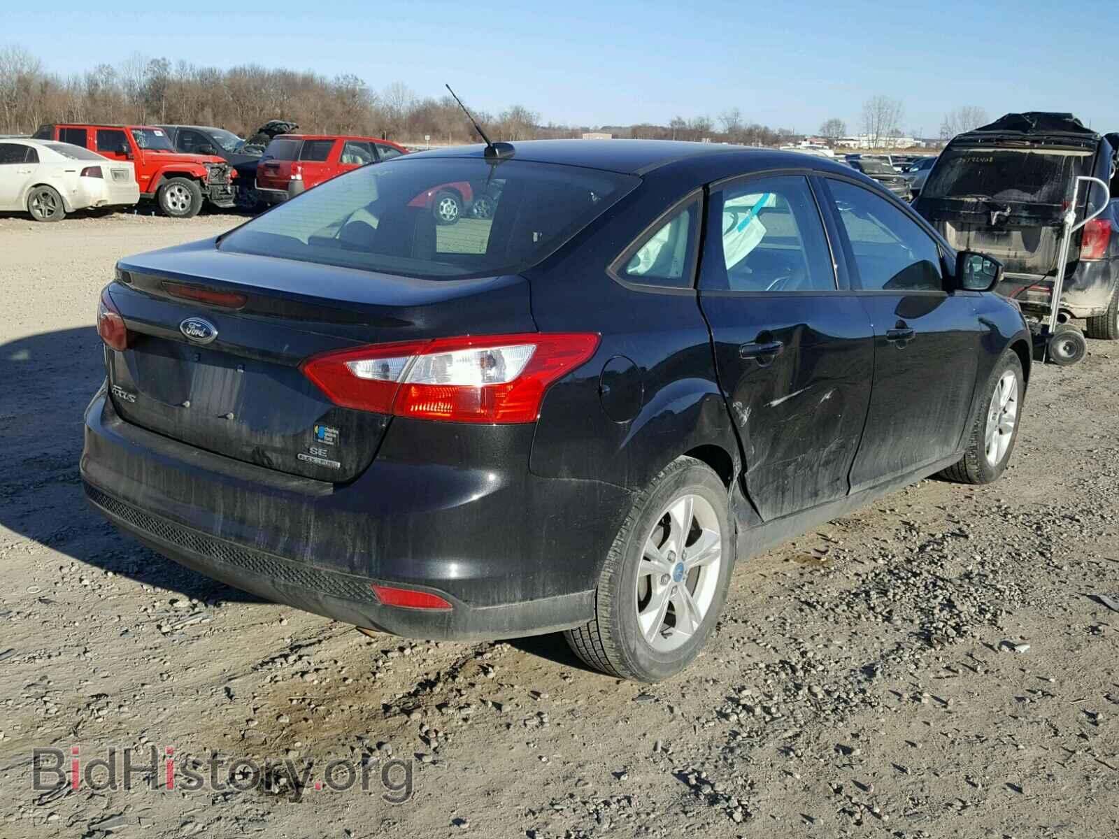 2013 FORD FOCUS - VIN: 1FADP3F28DL189577 - Photo 4