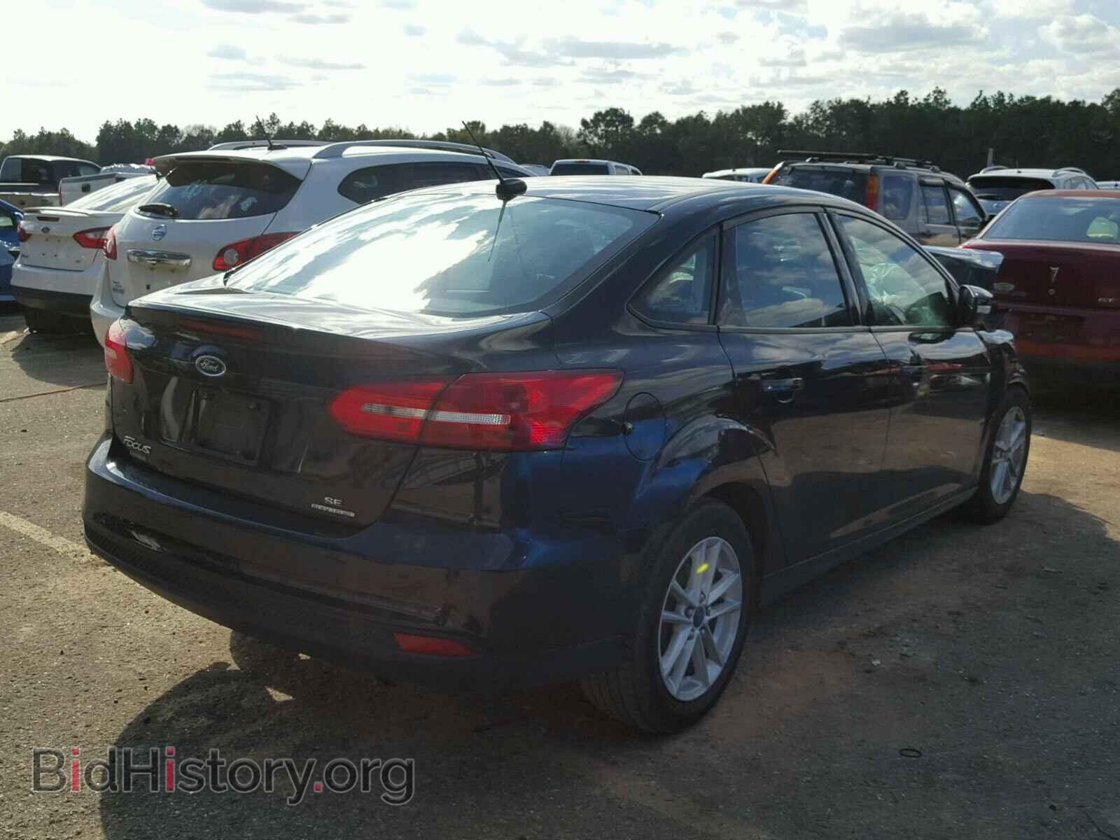 2015 FORD FOCUS - VIN: 1FADP3F24FL243606 - Photo 4
