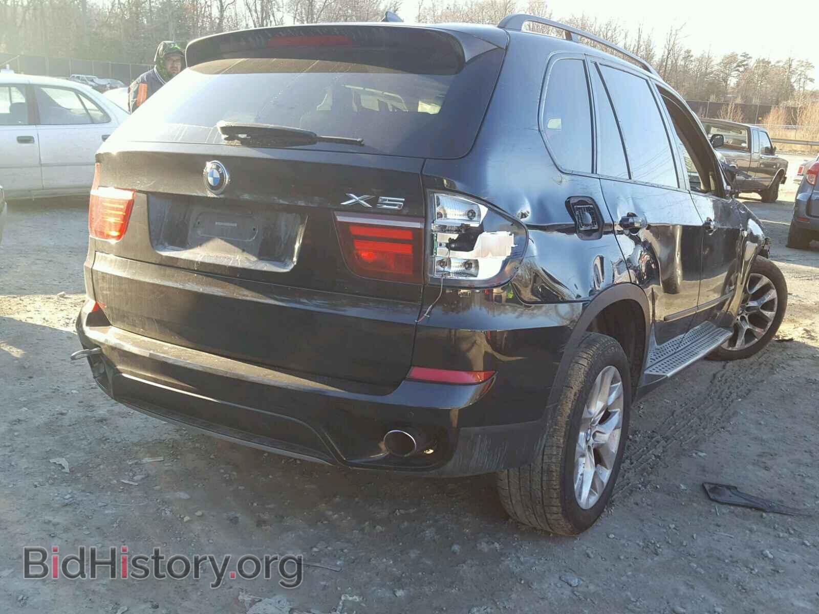 2011 BMW X5 - VIN: 5UXZV4C52BL411035 - Фото 4
