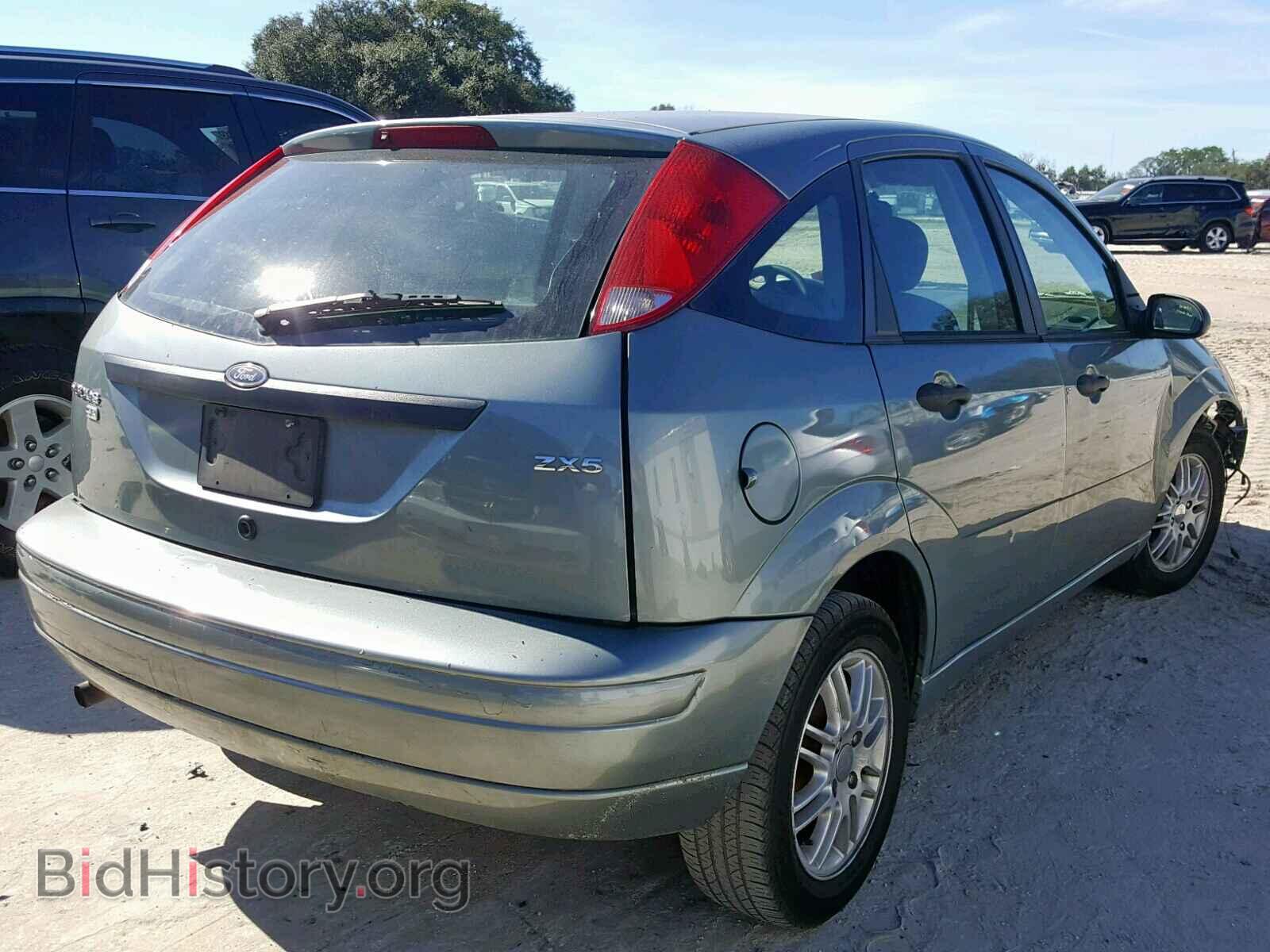 2005 FORD FOCUS - VIN: 3FAFP37N05R145657 - Фото 4
