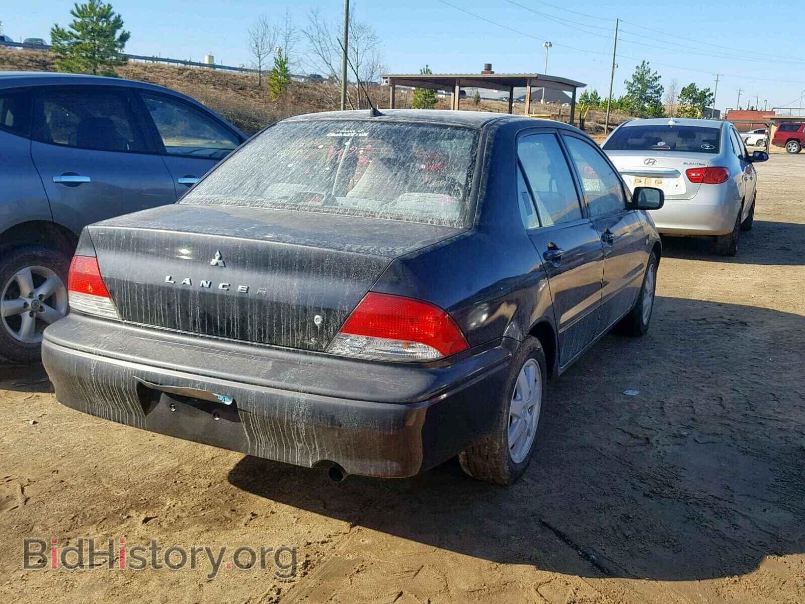 2002 MITSUBISHI LANCER - VIN: JA3AJ36E72U006376 - Photo 4