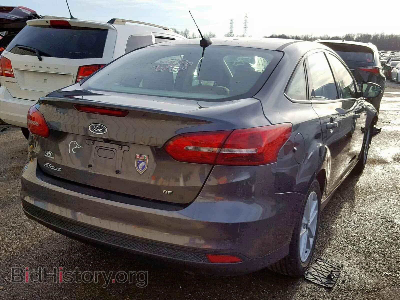 2017 FORD FOCUS SE - VIN: 1FADP3F2XHL317338 - Фото 4