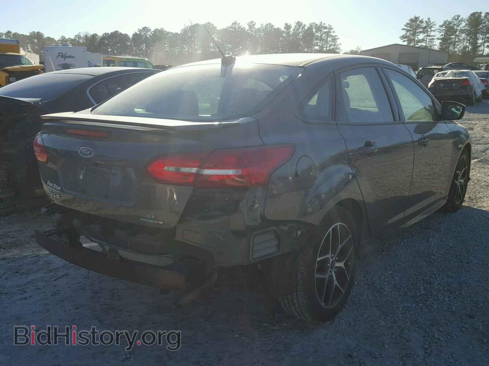 2016 FORD FOCUS - VIN: 1FADP3F21GL381637 - Photo 4