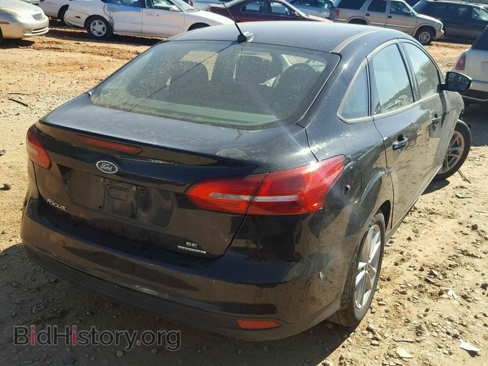 2016 FORD FOCUS - VIN: 1FADP3F26GL265950 - Photo 4