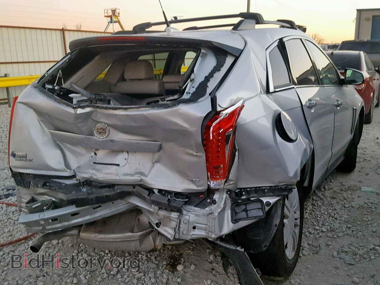2014 CADILLAC SRX - VIN: 3GYFNAE31ES532372 - Фото 4