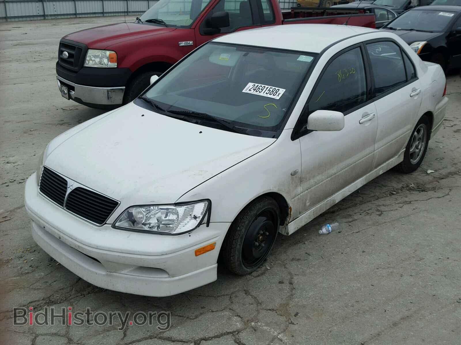 2002 MITSUBISHI LANCER - VIN: JA3AJ86E42U007854 - Photo 2