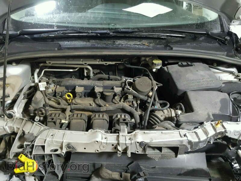 2012 Ford FOCUS (VIN 1FAHP3F24CL349440) — фото 7 из 10