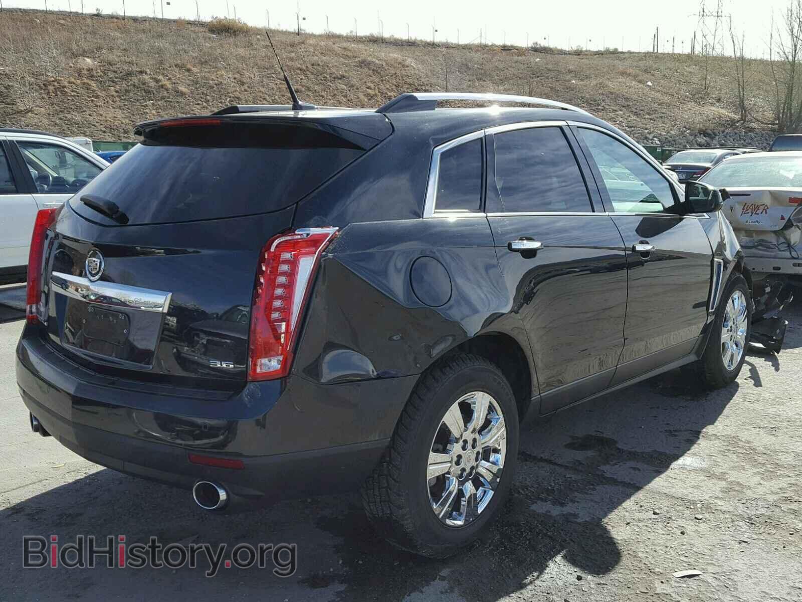 2014 CADILLAC SRX - VIN: 3GYFNEE36ES624472 - Фото 4