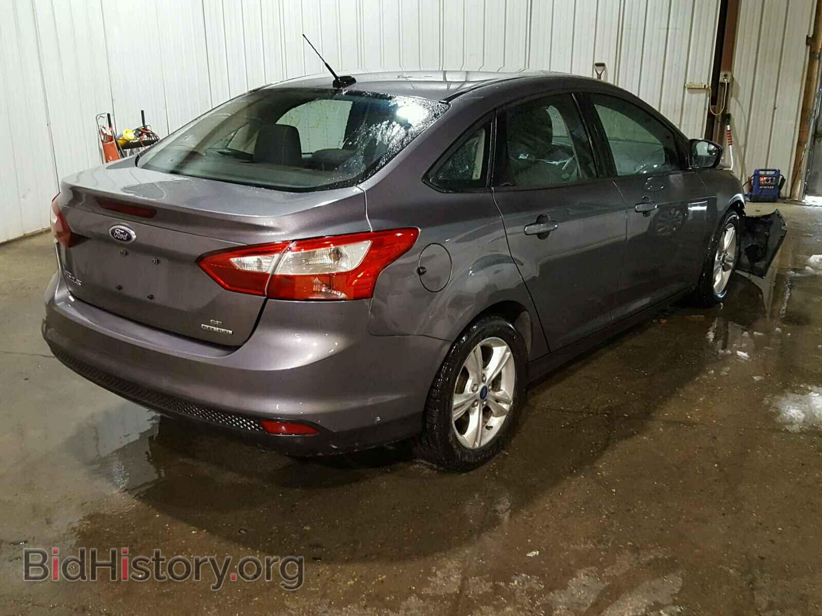 2014 FORD FOCUS - VIN: 1FADP3F21EL323251 - Photo 4
