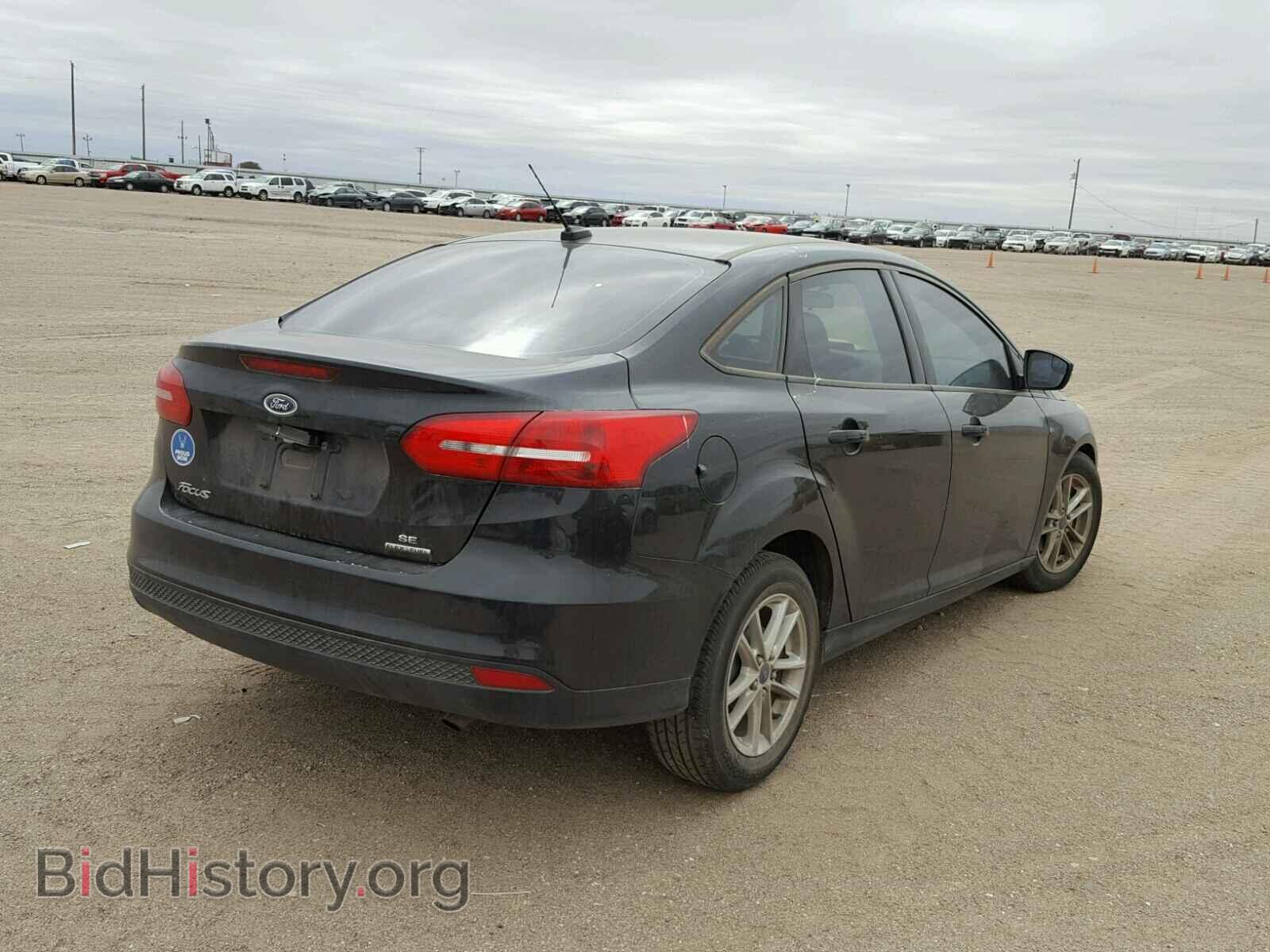 2015 FORD FOCUS - VIN: 1FADP3F22FL384822 - Photo 4