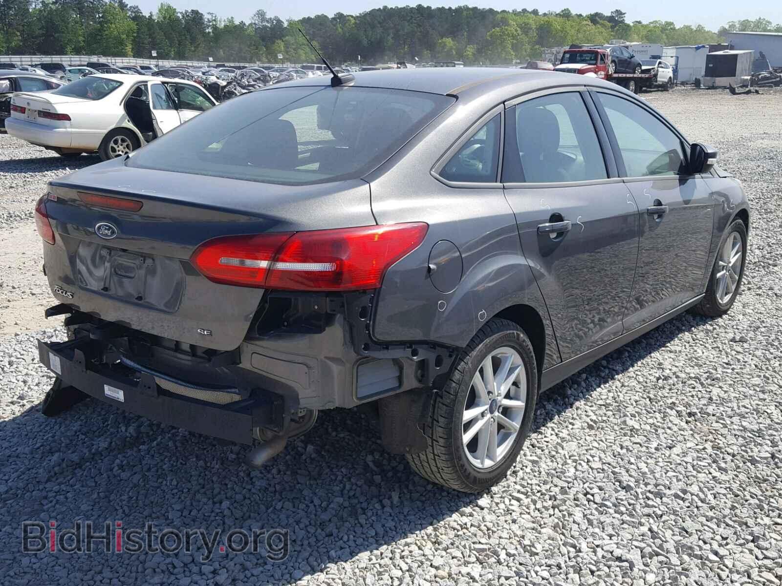 2015 FORD FOCUS - VIN: 1FADP3F29FL307817 - Photo 4
