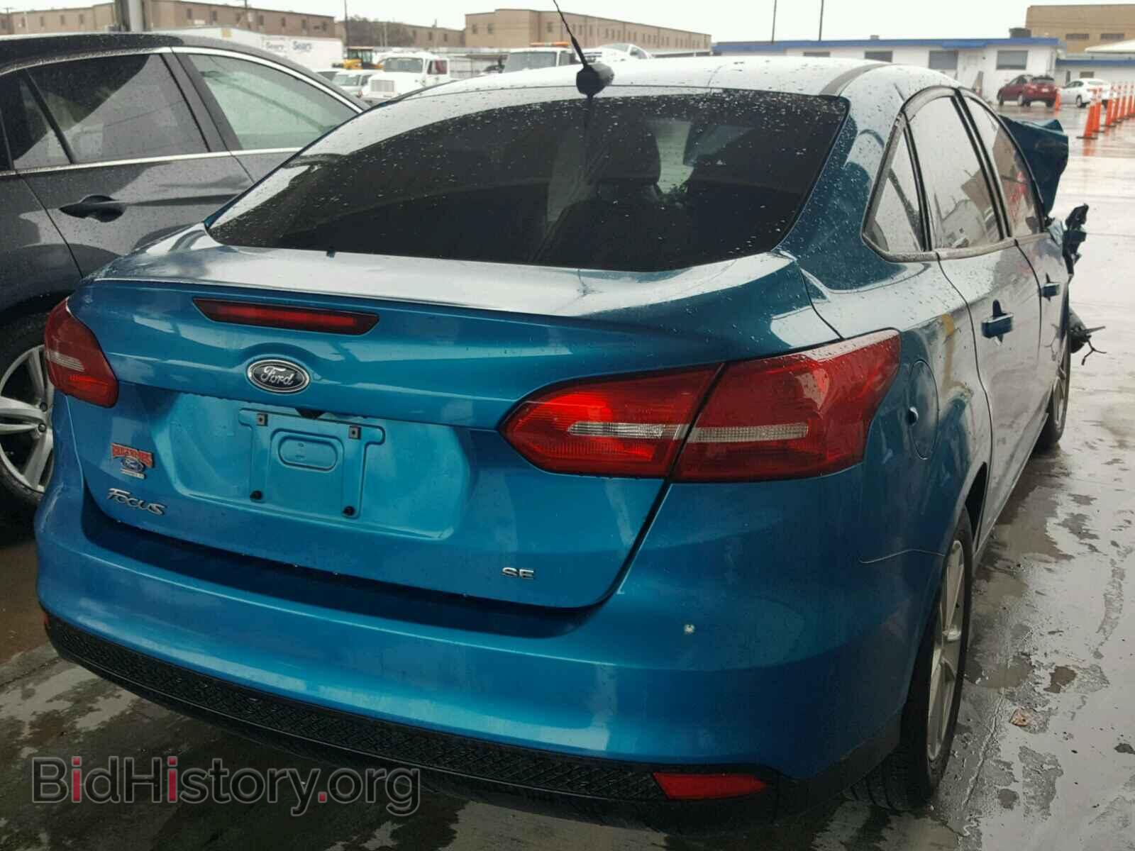 2017 FORD FOCUS - VIN: 1FADP3F21HL205009 - Photo 4