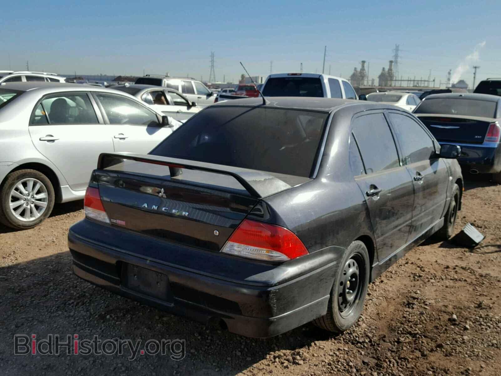 2002 MITSUBISHI LANCER - VIN: JA3AJ86E22U057779 - Photo 4