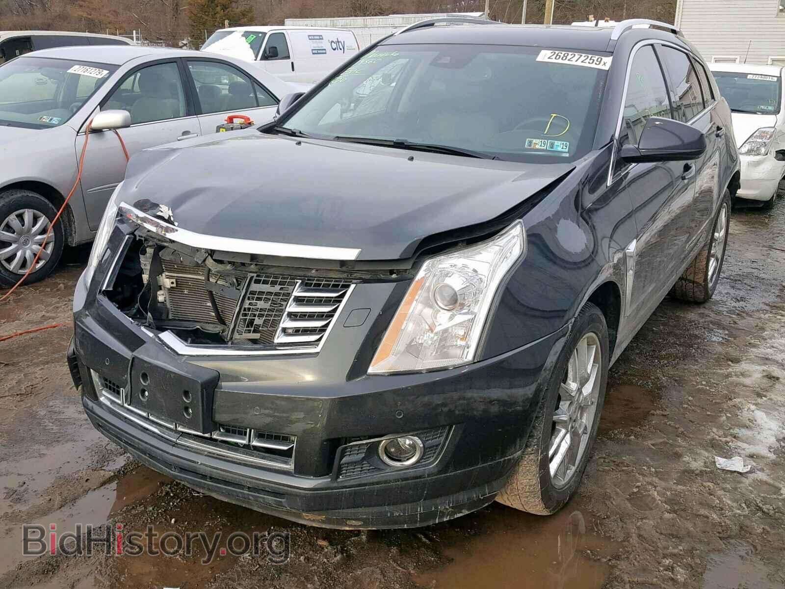 2014 CADILLAC SRX PERFOR - VIN: 3GYFNCE32ES590213 - Фото 2