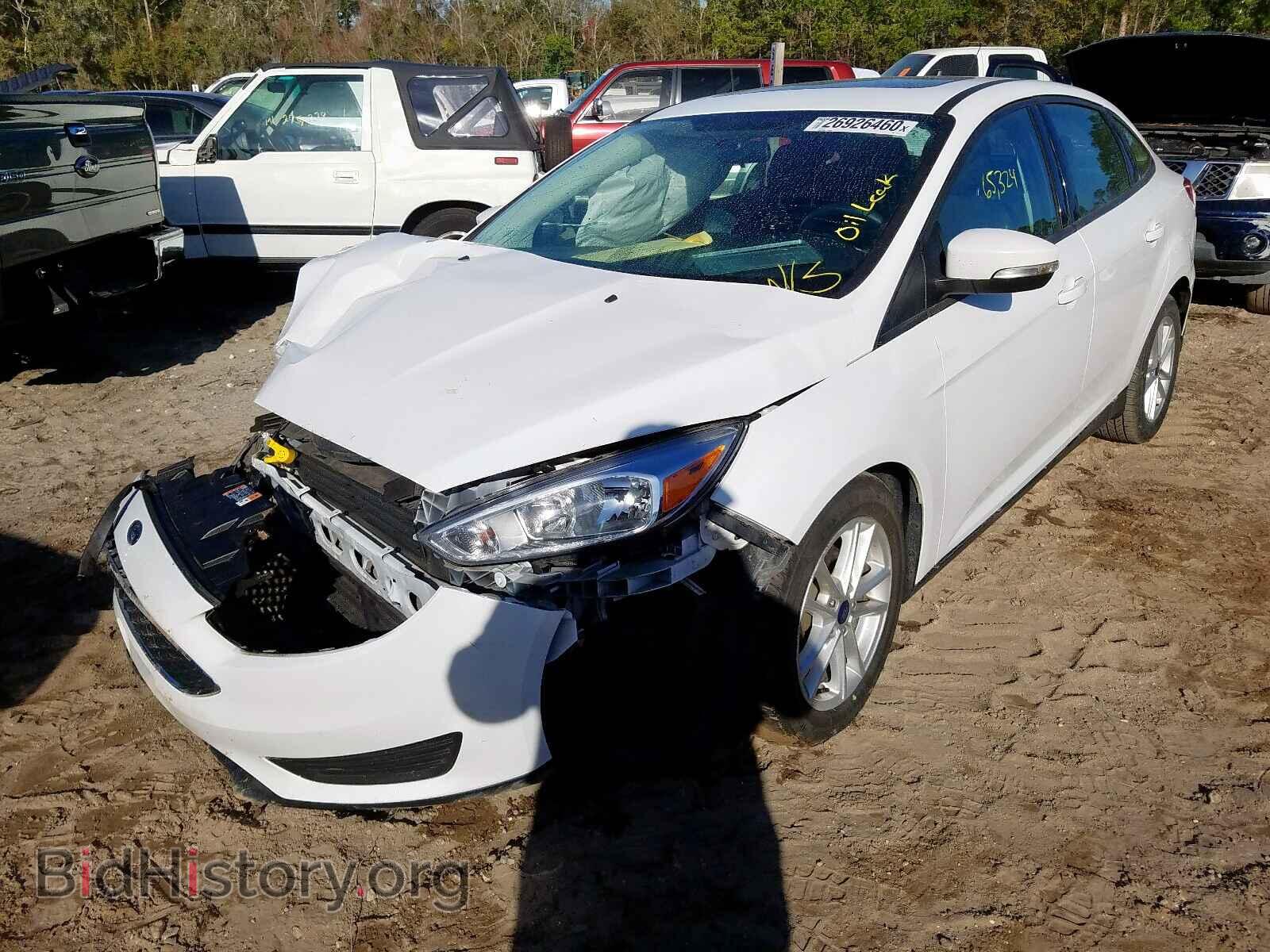 2016 FORD FOCUS - VIN: 1FADP3F22GL347979 - Фото 2