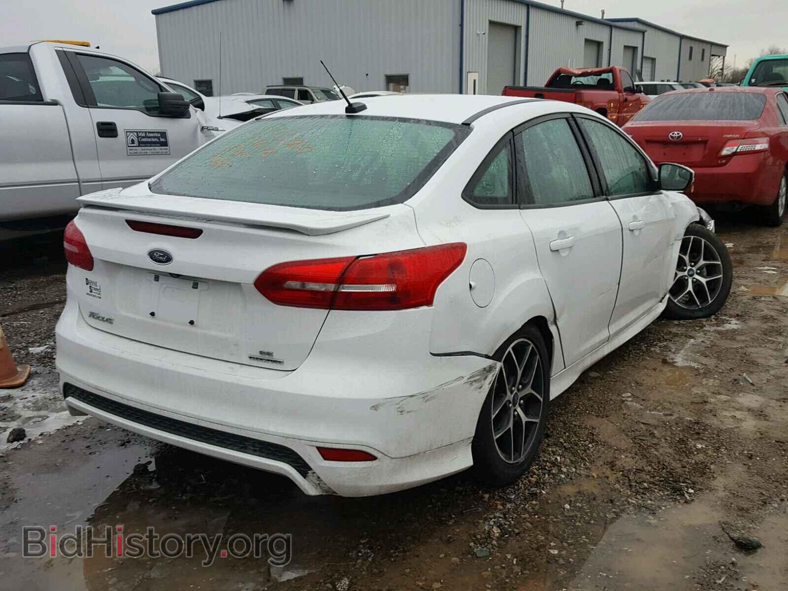2015 FORD FOCUS - VIN: 1FADP3F20FL313974 - Photo 4