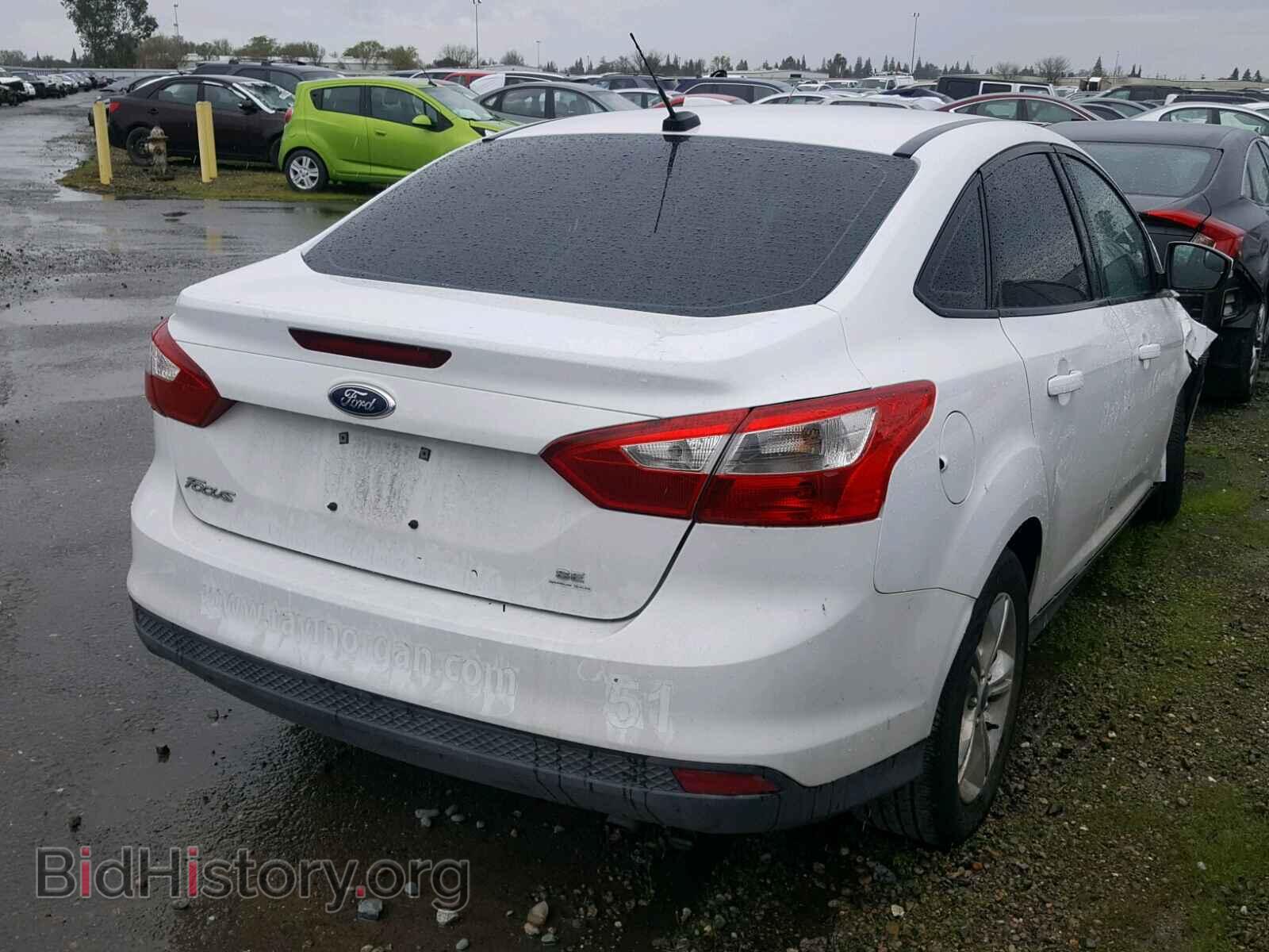 2014 FORD FOCUS - VIN: 1FADP3F21EL382669 - Photo 4