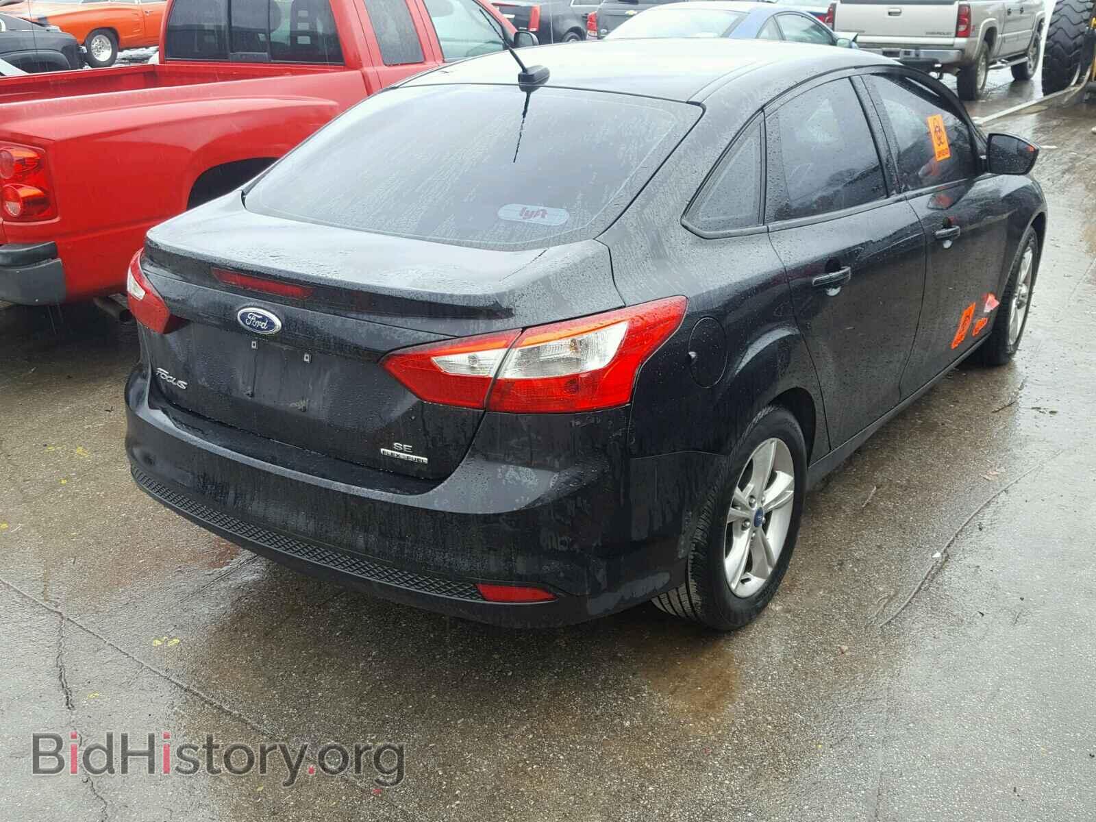 2014 FORD FOCUS - VIN: 1FADP3F23EL105876 - Photo 4