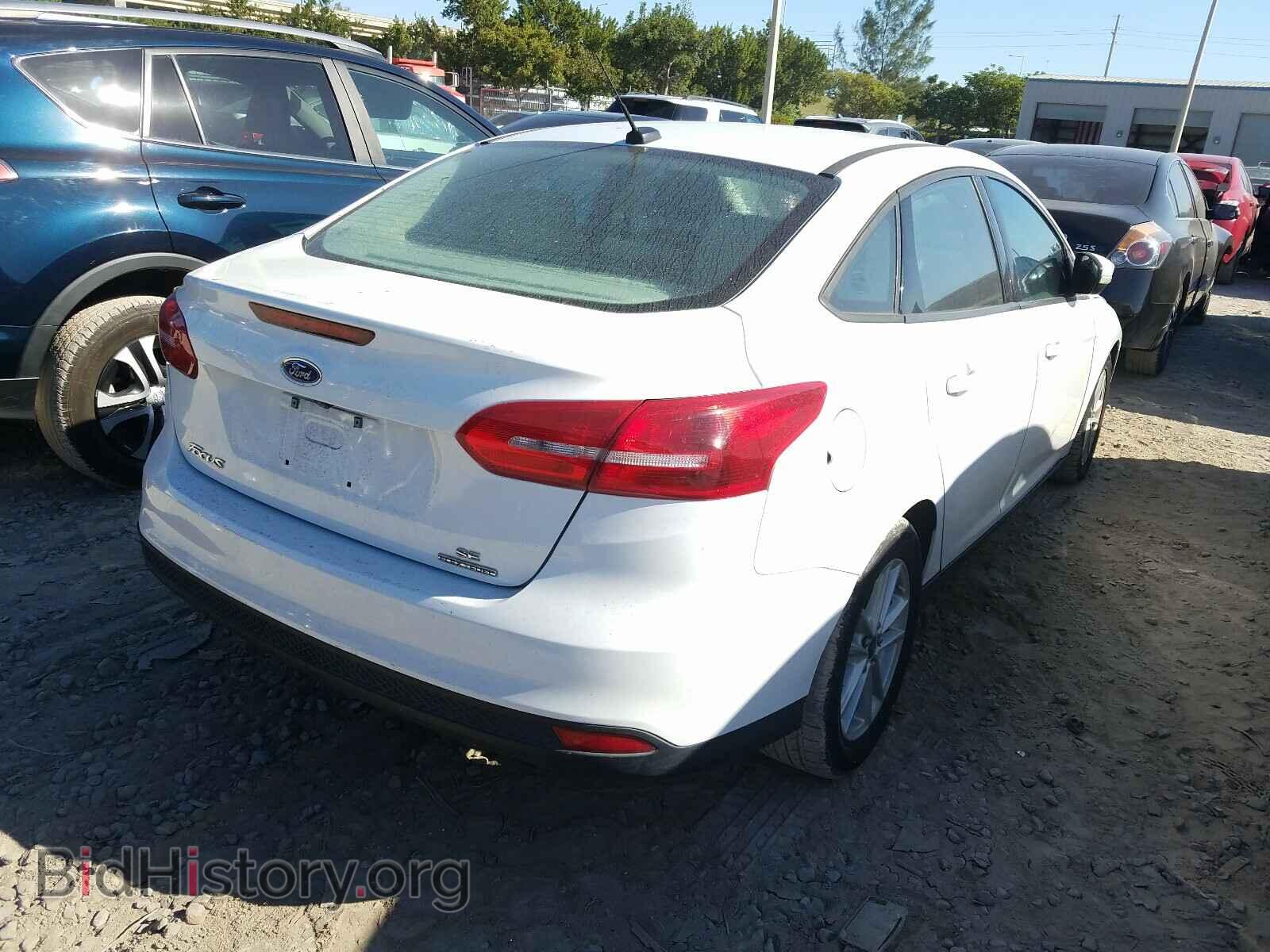 2015 FORD FOCUS - VIN: 1FADP3F20FL345243 - Photo 4