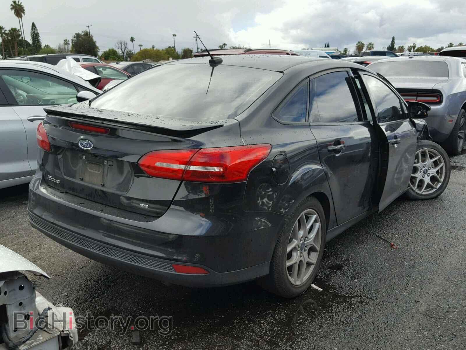 2015 FORD FOCUS - VIN: 1FADP3F20FL361619 - Photo 4