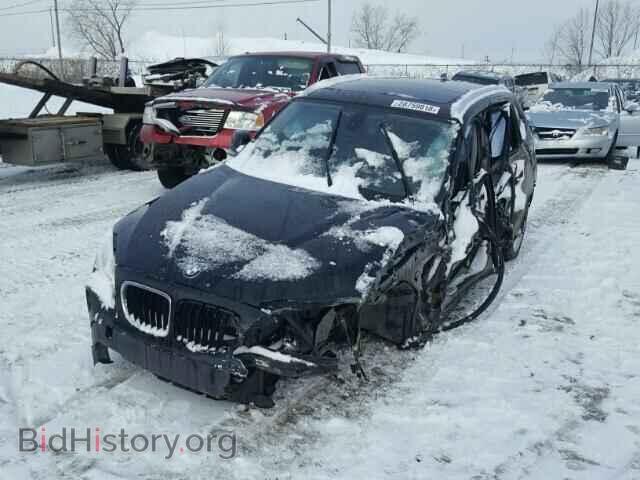 2012 BMW X1 - VIN: WBAVL1C5XCVR78178 - Фото 2
