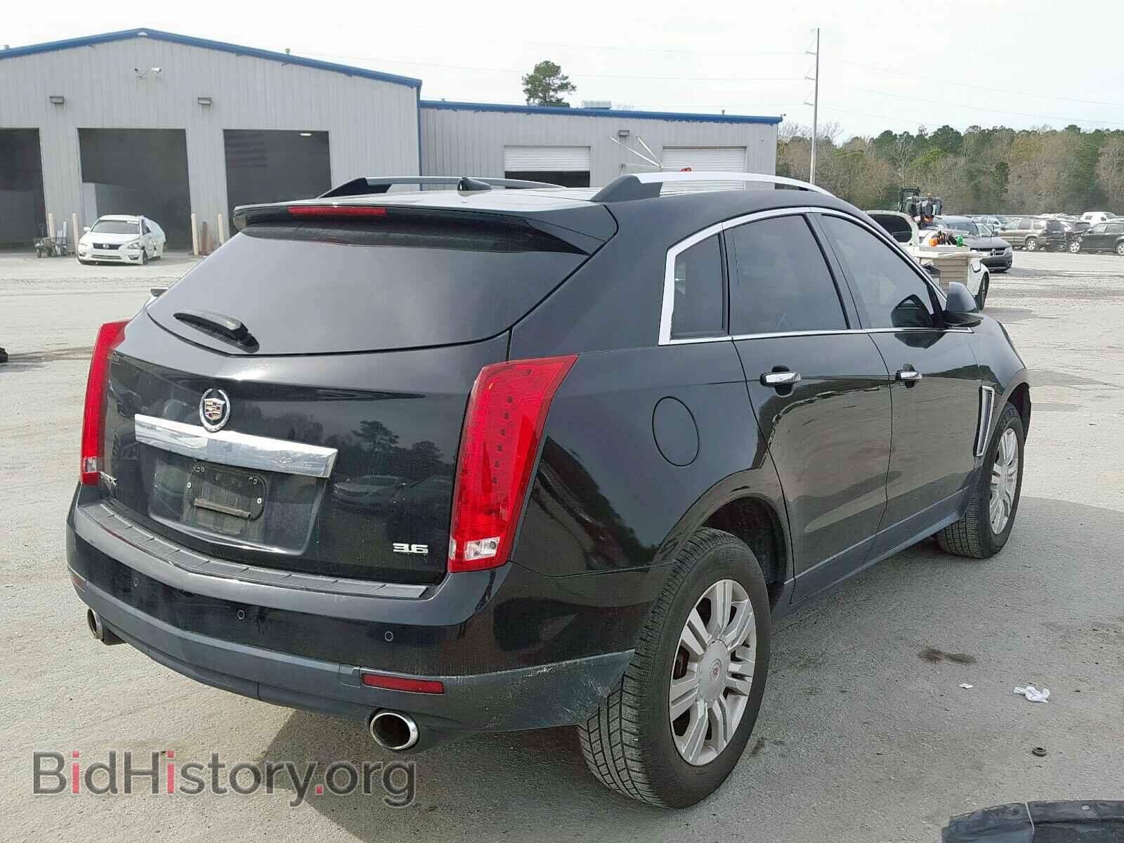 2014 CADILLAC SRX - VIN: 3GYFNBE3XES628085 - Фото 4