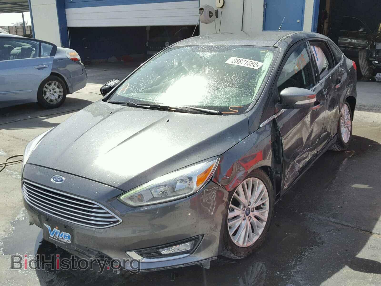 2016 FORD FOCUS - VIN: 1FADP3J22GL374350 - Фото 2