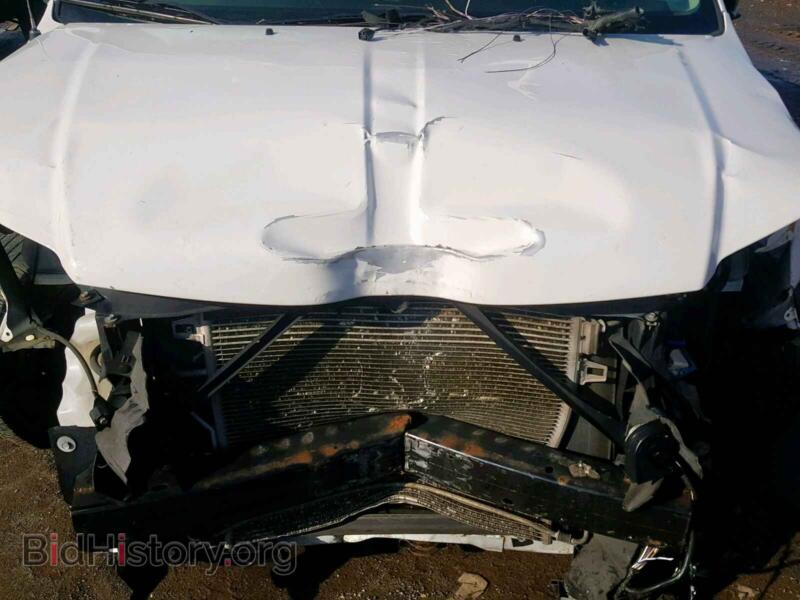 2012 Dodge RAM VAN (VIN 2C4JDGAG5CR360937) — photo 7 of 10