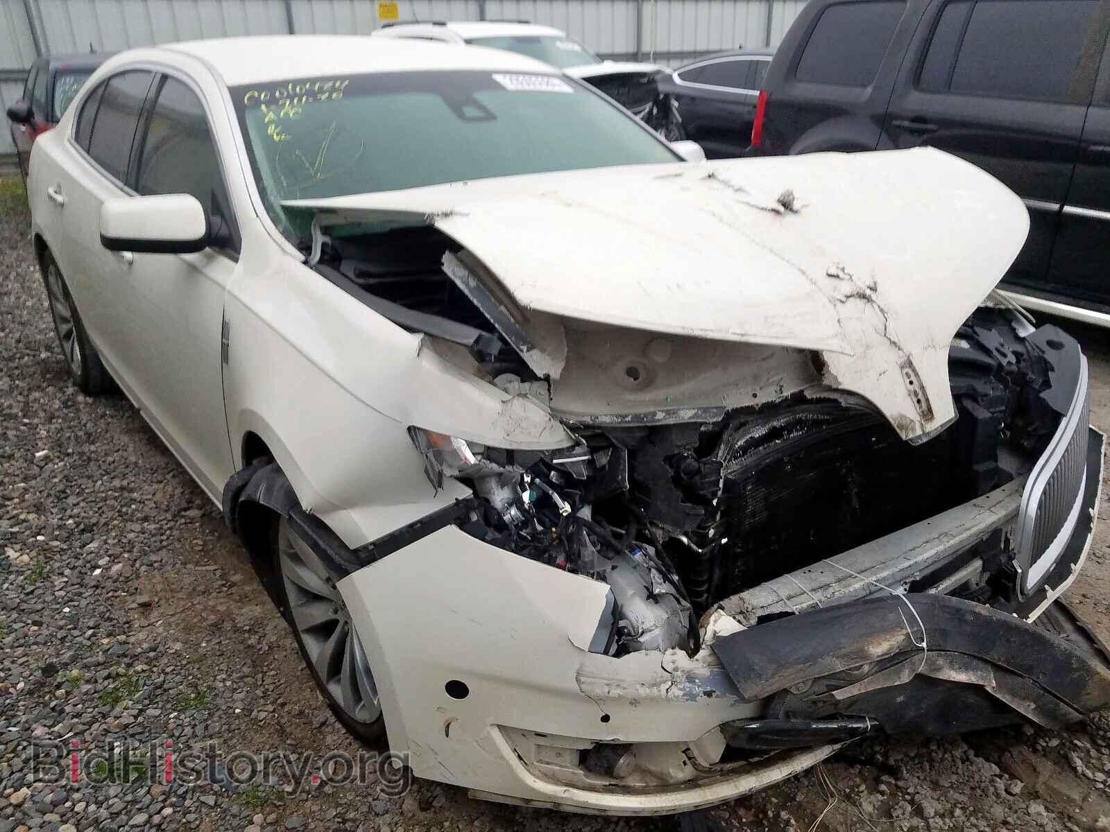 Фотография 1LNHL9DK7DG610352 - LINCOLN MKS 2013