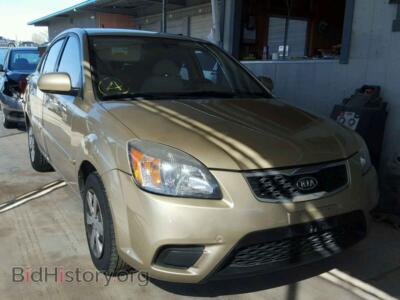 2011 Kia RIO BASE, золотистый — VIN KNADH4A32B6734128, Copart