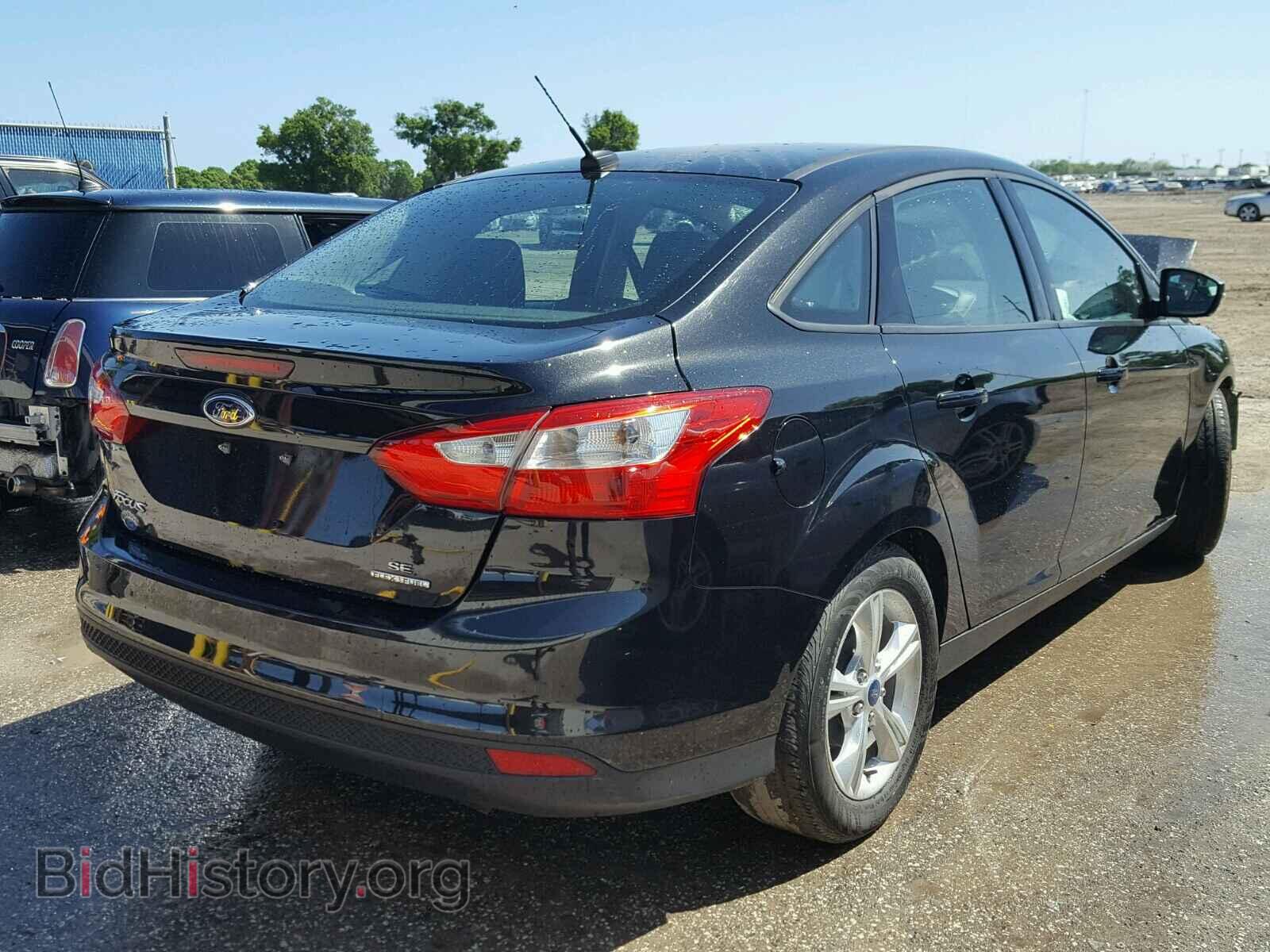 2014 FORD FOCUS - VIN: 1FADP3F24EL216369 - Photo 4