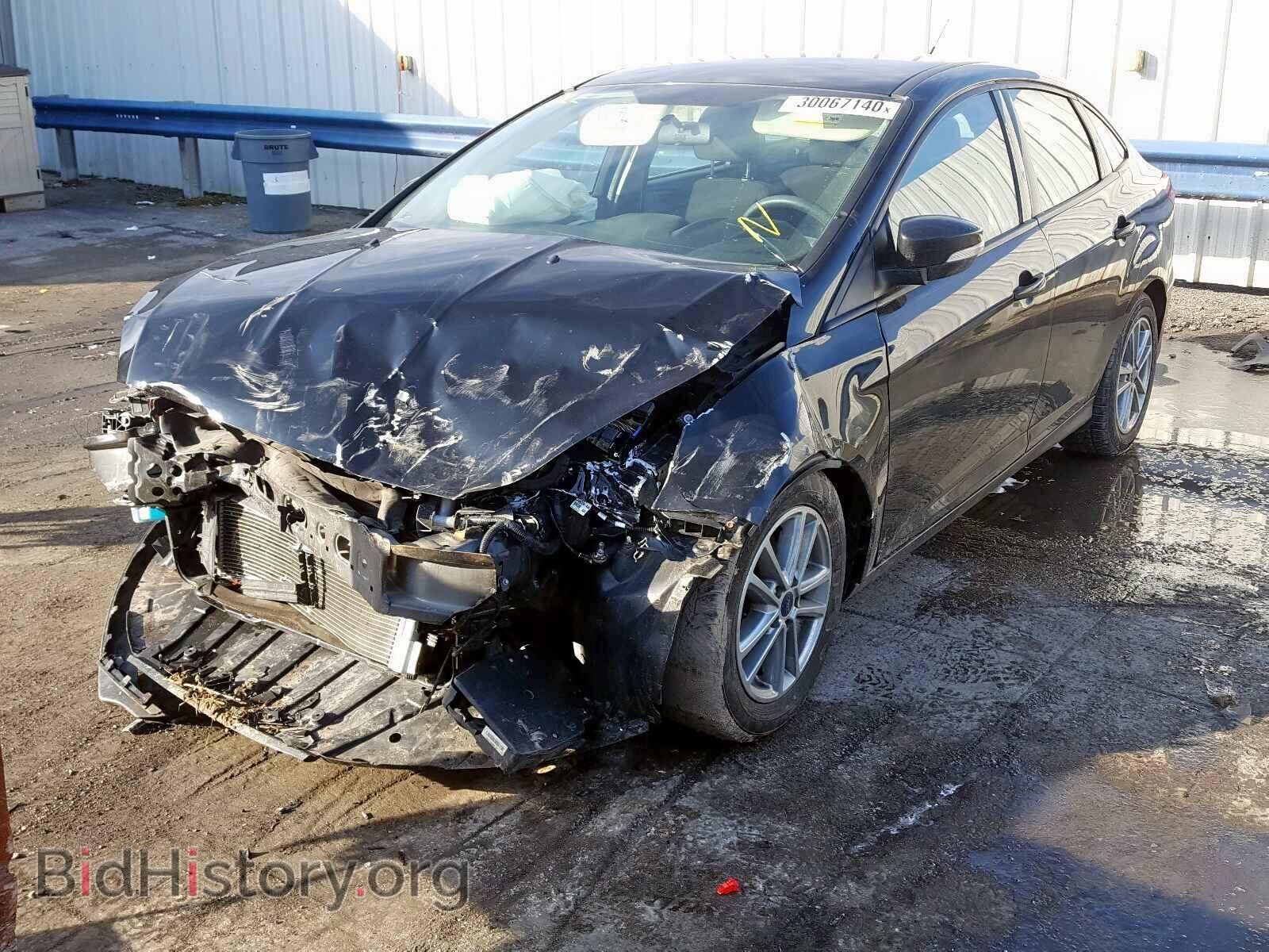 2016 FORD FOCUS - VIN: 1FADP3F25GL266877 - Photo 2