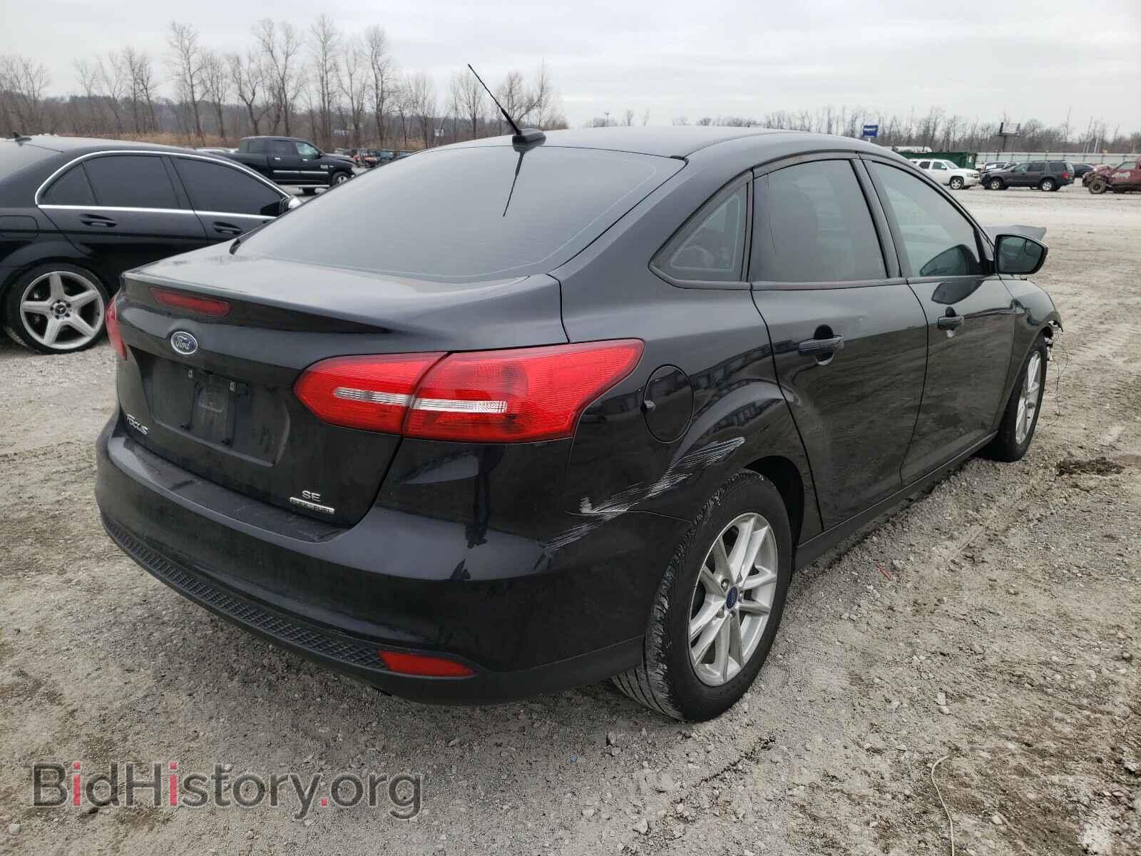 2016 FORD FOCUS - VIN: 1FADP3F23GL319088 - Photo 4