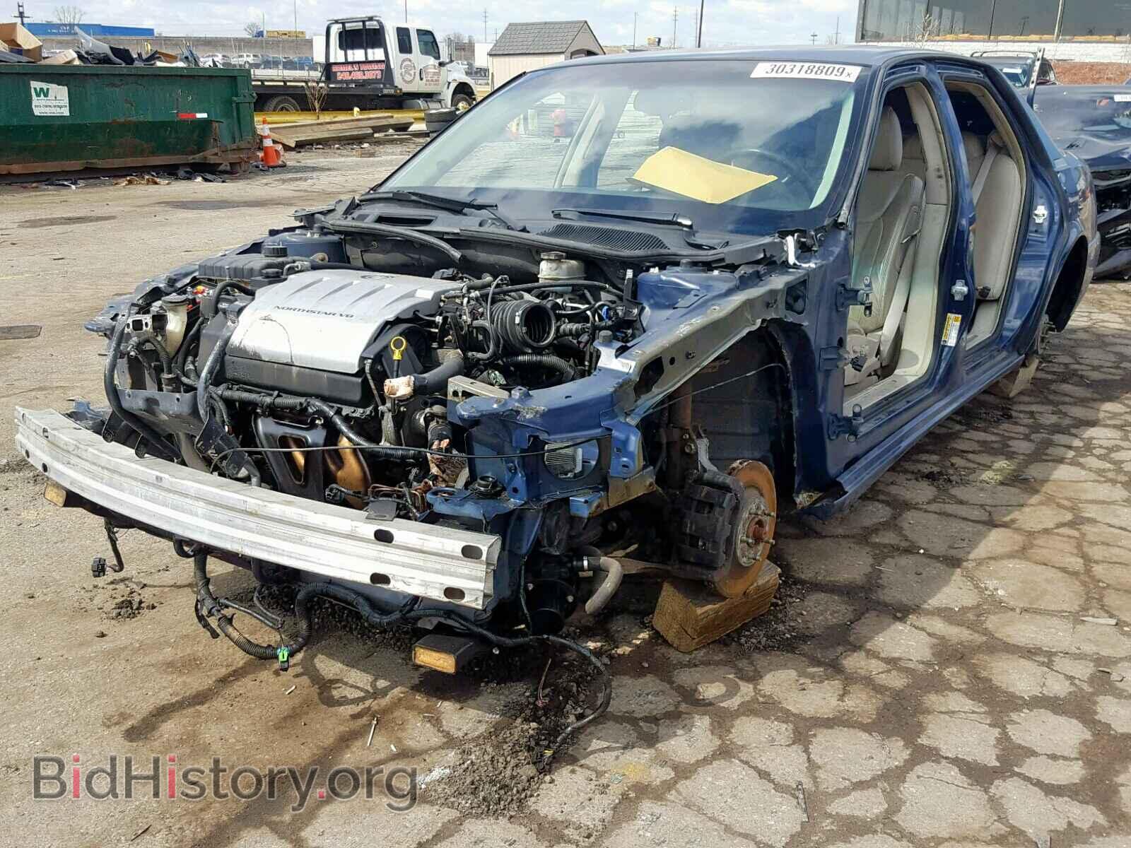 2009 CADILLAC DTS - VIN: 1G6KD57Y69U108329 - Фото 2