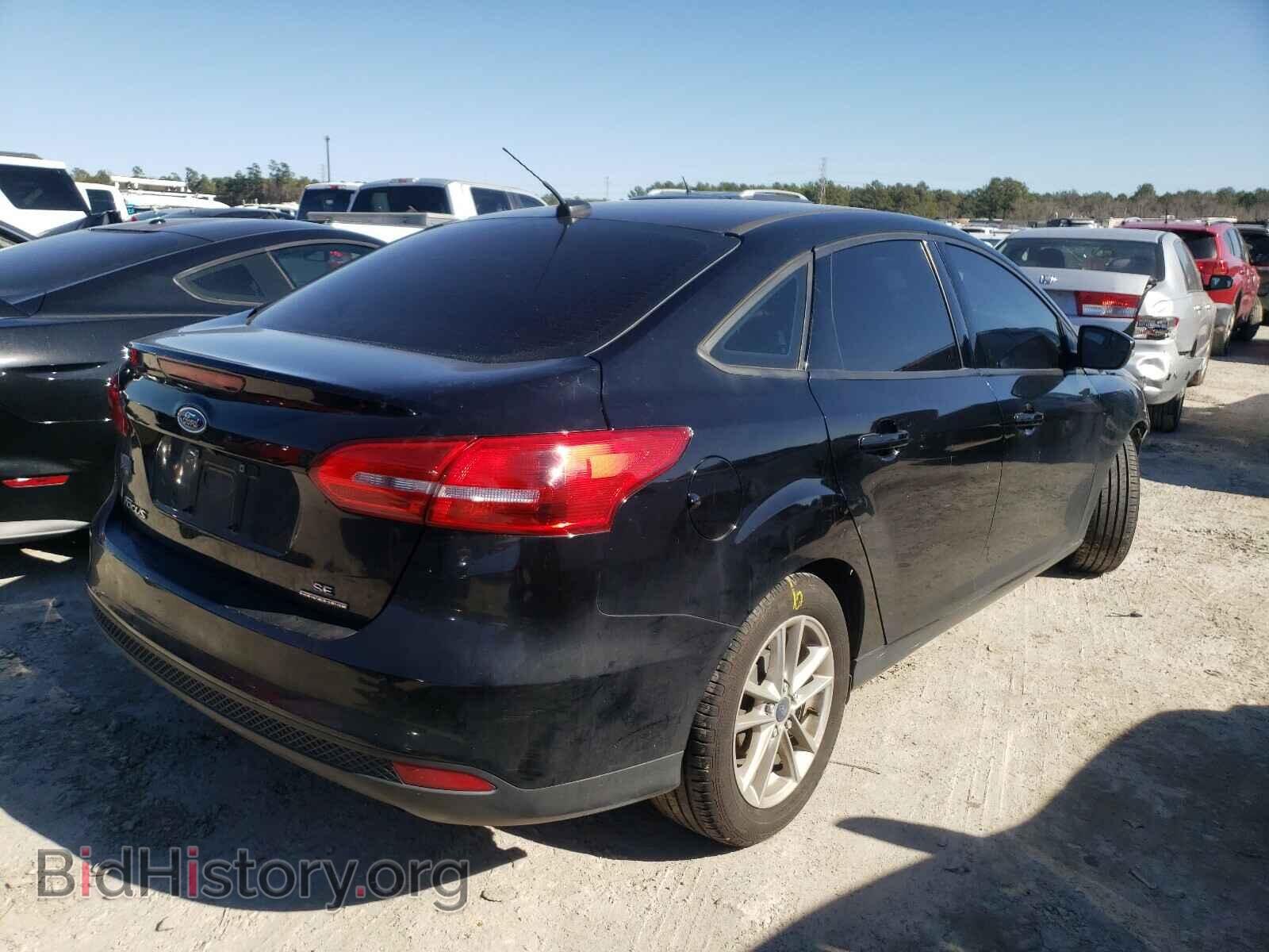 2016 FORD FOCUS - VIN: 1FADP3F26GL360010 - Photo 4